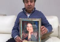 Vancouver businessman Sanjay Goel and his father Dr. Sadan Goel holding a portrait of the murdered Dr. Asha Goel